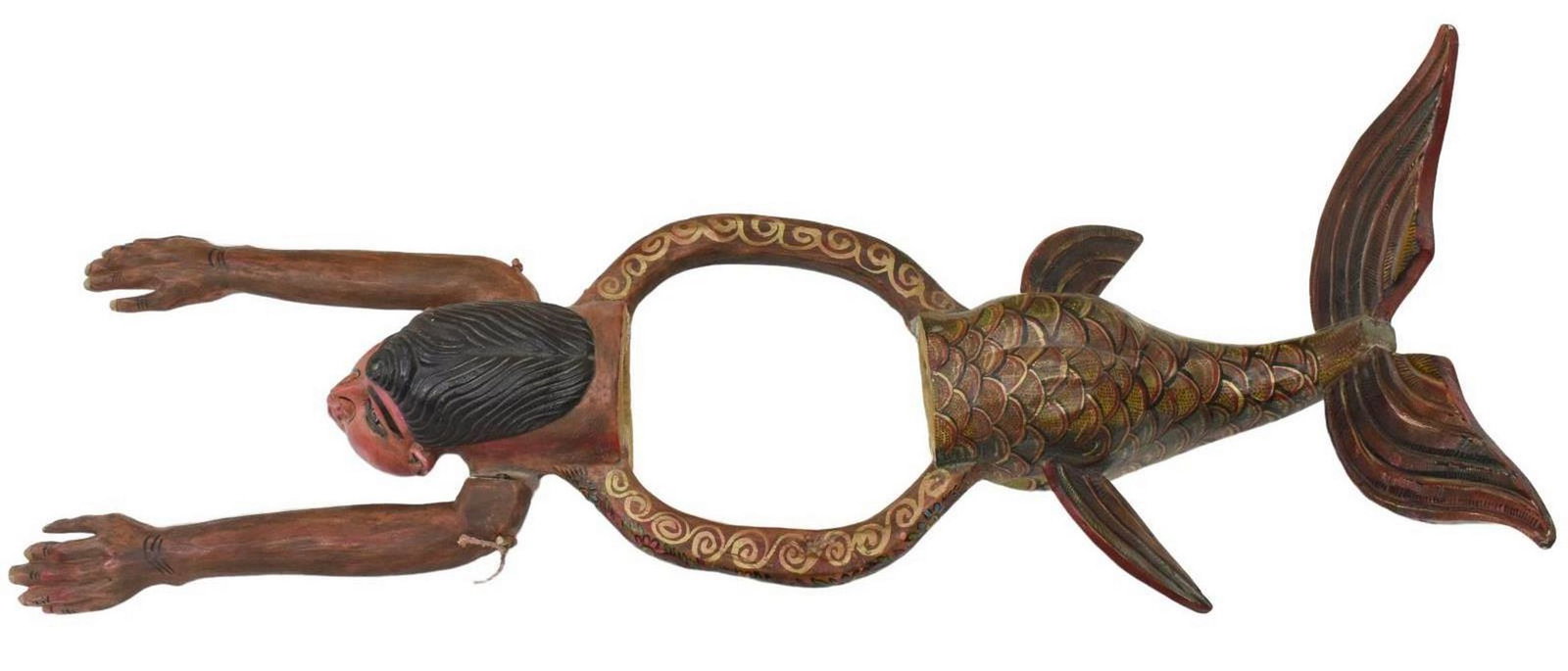 MEXICO FOLK ART CARVED & PAINTED MERMAID: Folk art carved and painted mermaid, Mexico, with articulated arms and central circular cut out to ring, approx 13.5"h, 50.5"l, 18.5"w, interior circumference is approx 36" **Provenance: From the esta