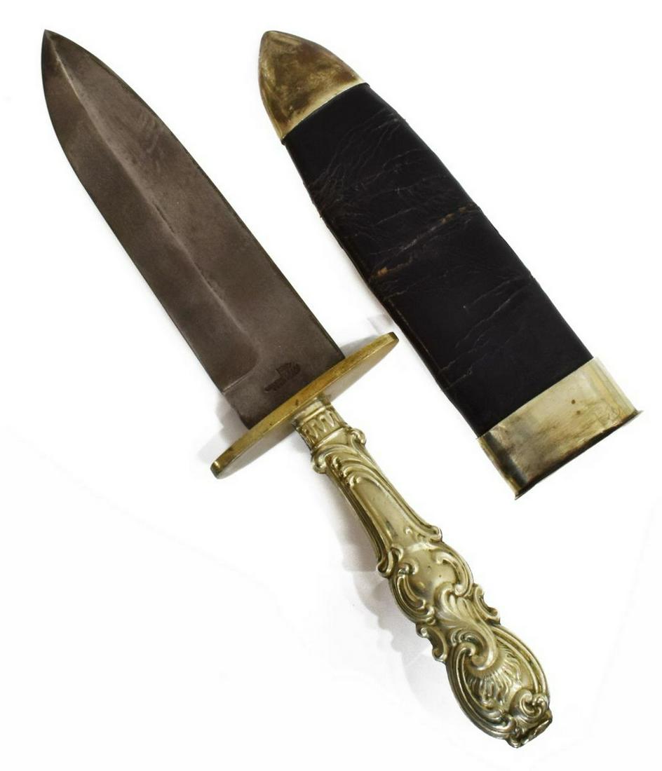 WALKER & HALL BOWIE KNIFE: Walker & Hall Bowie knife, the spear point 6.75" blade with maker's mark at ricasso, unmarked foliate silver plate handle, housed in leather sheath with German silver tip and throat, overall: approx 1