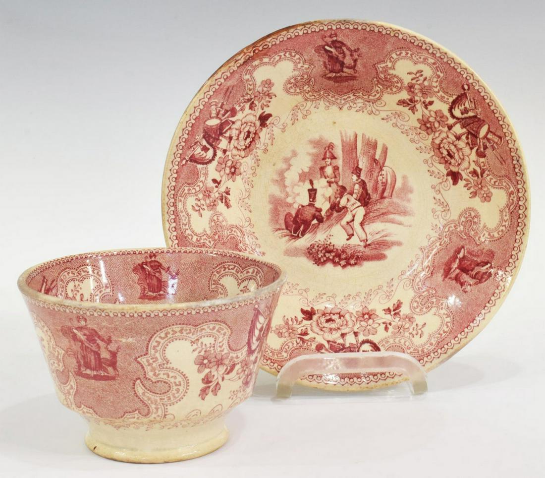 (2 PC) STAFFORDSHIRE TEXIAN CAMPAIGNE CUP & SAUCER: (2 pieces) Scarce English Staffordshire cup and saucer, in the "Texian Campaigne" pattern, James Beech, c.1850, with red transfer printed decoration, scene with officer and men at rest around a fire,