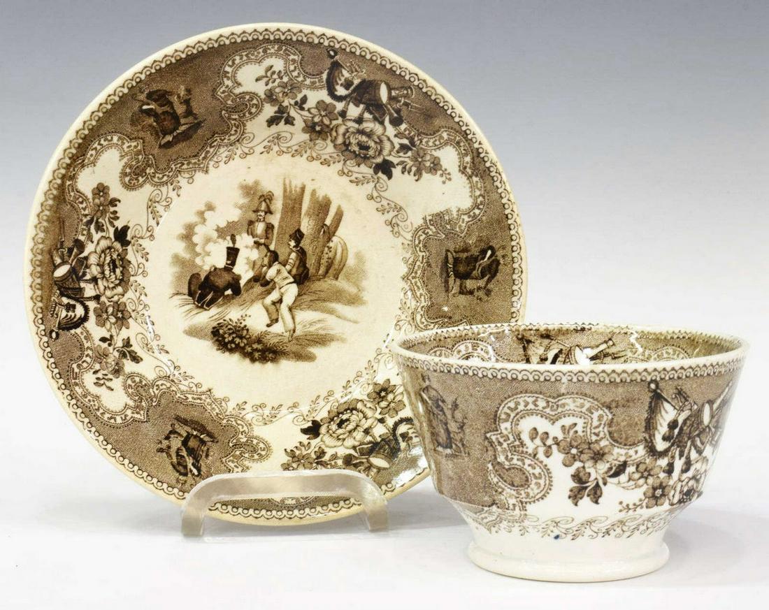 (2 PC) STAFFORDSHIRE TEXIAN CAMPAIGNE CUP & SAUCER: (2 pieces) Scarce English Staffordshire cup and saucer, in the "Texian Campaigne" pattern, James Beech, c.1850, with brown transfer printed decoration, scene with officer and men at rest around a fire