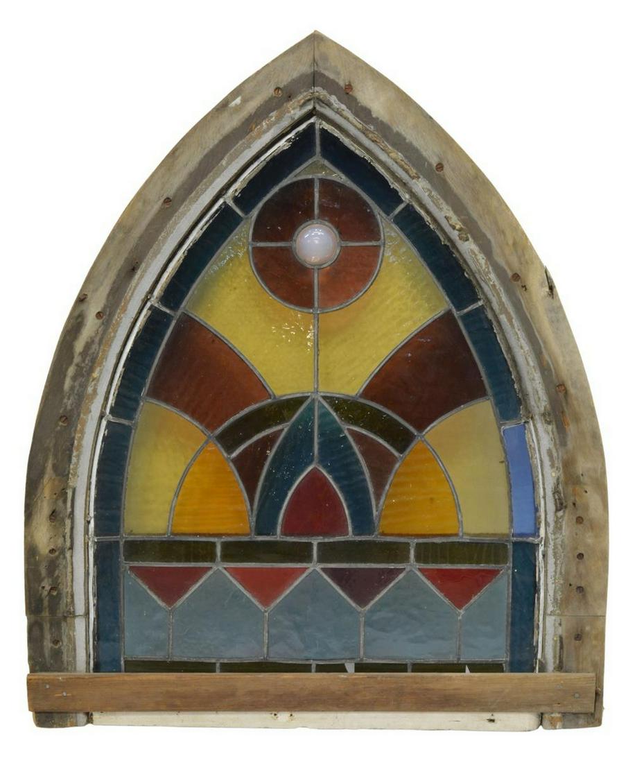 GOTHIC STYLE STAINED & LEADED GLASS ARCHED WINDOW: Architectural Gothic style stained and leaded glass window, having tapered arch form, polychrome textured panels, globular iridescent orb, loss to two panes near base, approx 36"h, 30.5"w, 2.5"d Start