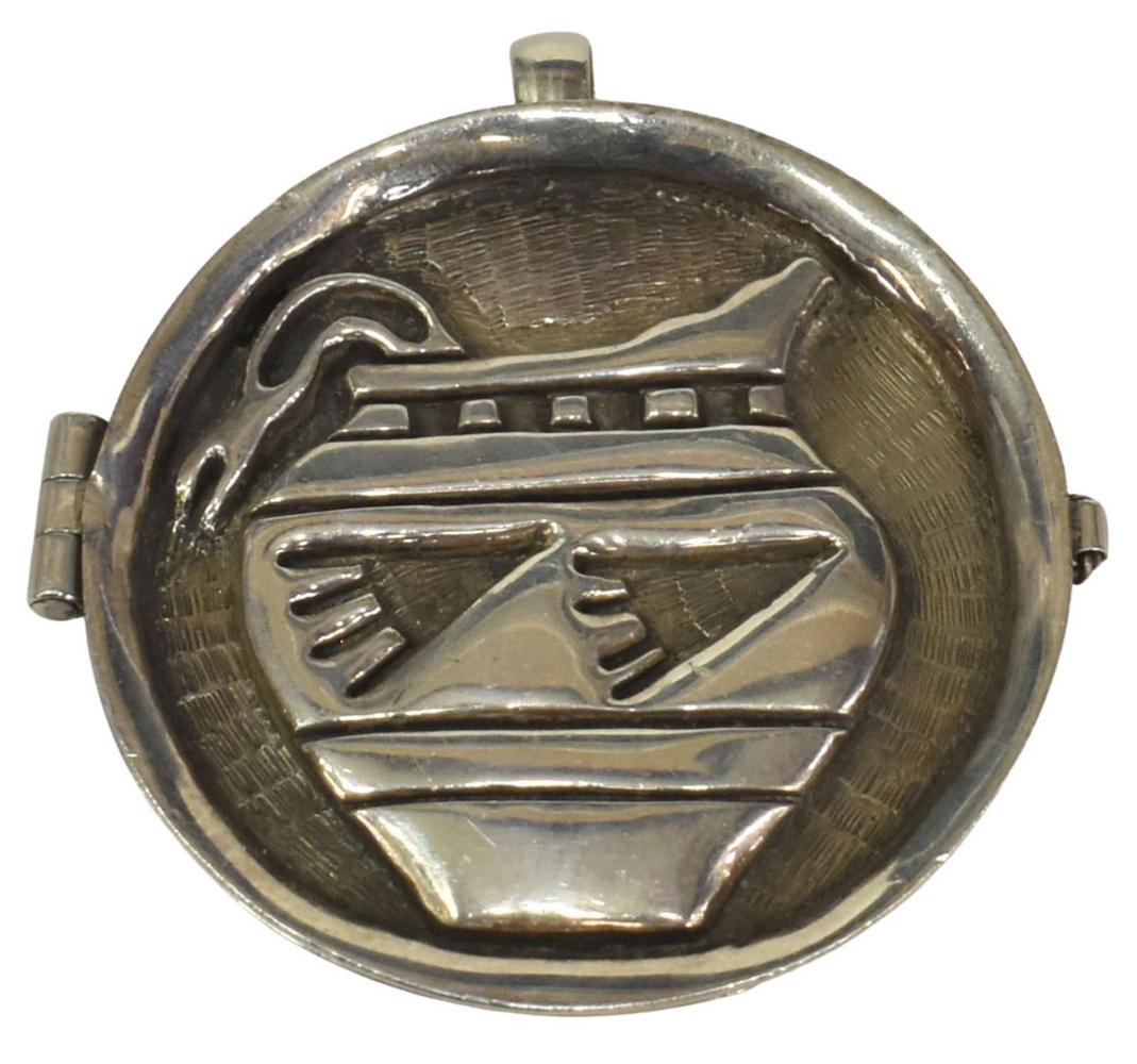 BOBBY TEWA (B.1948) SILVER OVERLAY LOCKET PENDANT: Native American silver (content unknown) locket pendant, Bobby Tewa (San Juan Pueblo, b.1948), with silver overlay pottery design, approx 2 1/8"h, 2"w (including bail), 33.5 grams *Provenance: The fam