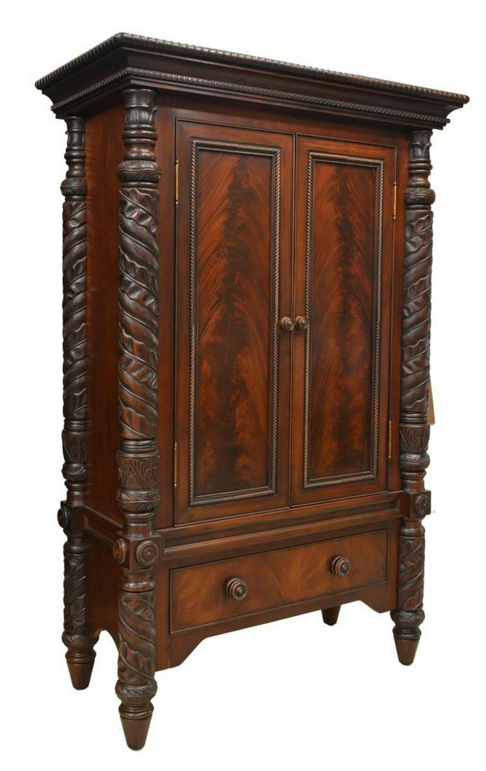 POLO RALPH LAUREN PLANTATION STYLE ARMOIRE: Plantation style mahogany armoire, Polo Ralph Lauren, late 20th c., molded cornice, pilasters with palm fronds, double doors over lower exterior drawer, rising on tapered feet, no interior shelves, co