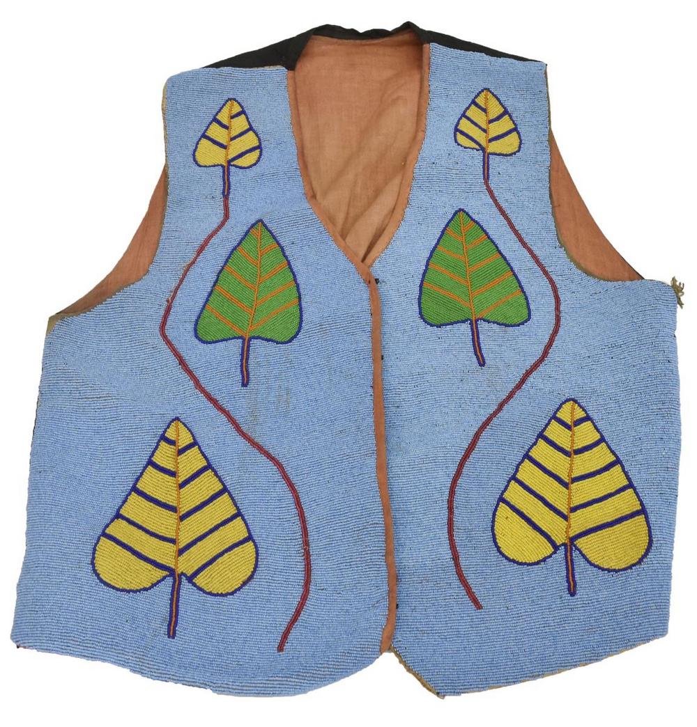 PLATEAU FULLY-BEADED VEST, C.1880-1900: Native American beaded vest, Plateau, c.1880-1900, fully-beaded front with stylized foliate design, cloth backing, approx 23.5"l, 17"w, 1.75lbs Start Price: $300.00