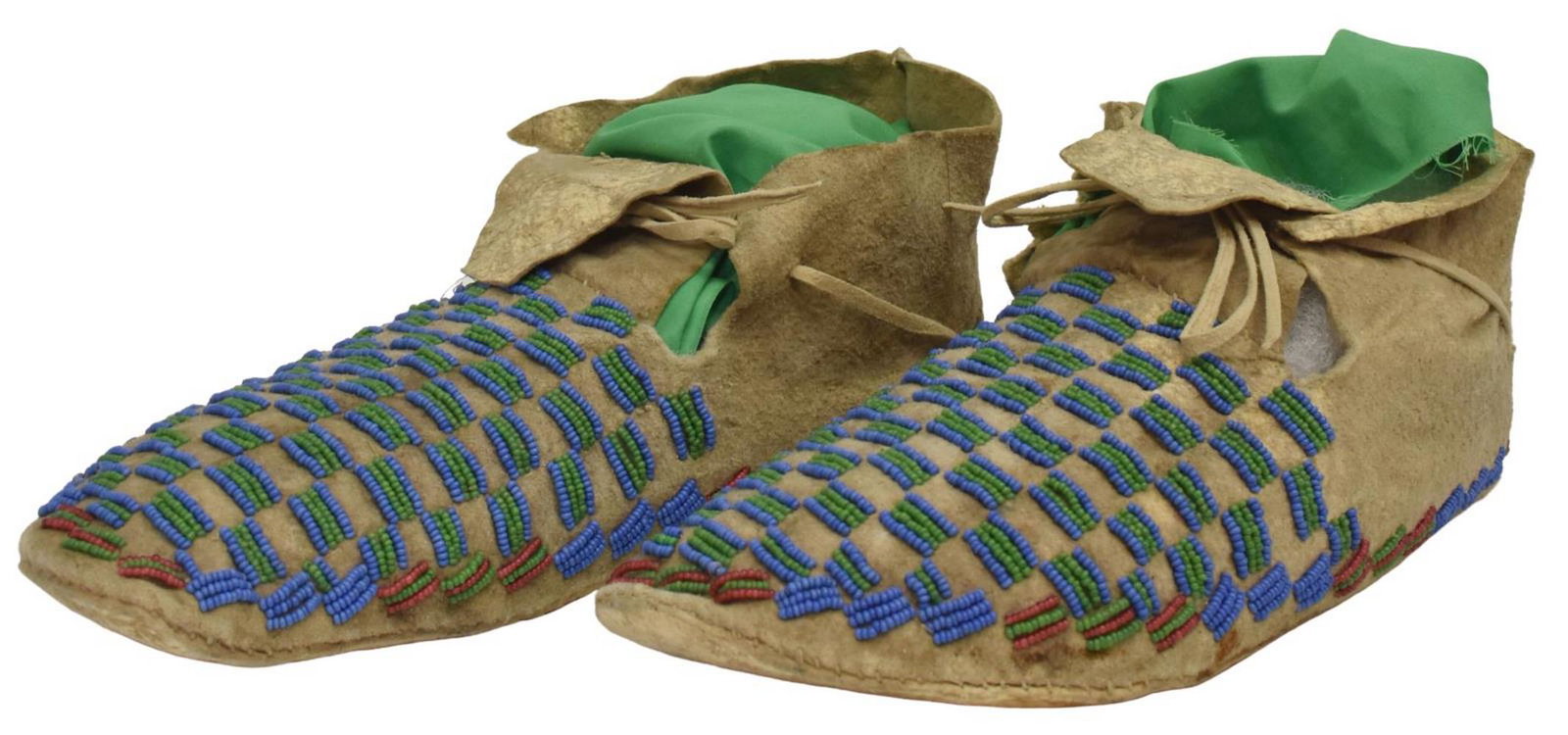 SIOUX BEADED HIDE MOCCASINS, C.1880-1900: Native American beaded hide moccasins, Sioux, c.1880-1900, partial-beaded checkered design, approx 10"l, 0.75lbs Start Price: $300.00