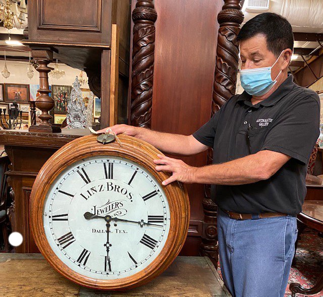 LINZ BROTHERS JEWELERS OAK ADVERTISING WALL CLOCK: Linz Brothers Jewelers oak advertising wall clock, early 20th c., manufactured by the New Haven Clock Company (New Haven, Connecticut), hinged glass door opening to white clock face, with black roman 
