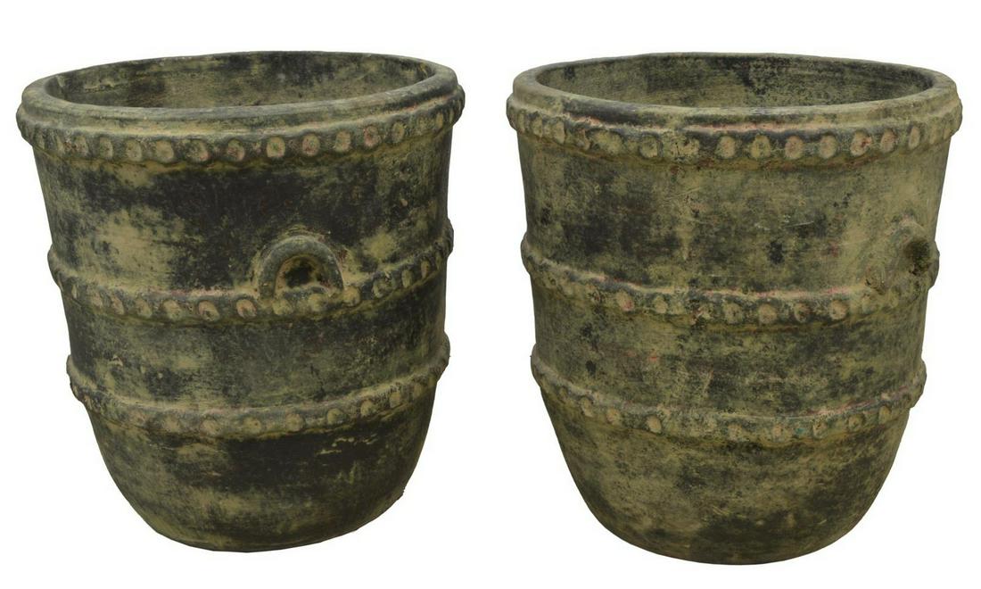 (2) LARGE EARTHENWARE VERDE FINISH FLOOR PLANTERS: (pair) Large earthenware floor planters, 20th c., in an antiqued verde finish, body with three textured bands, faux loop handles, approx 24.5"h, 22"diam **Provenance: From the Snaffle Bit Ranch estate