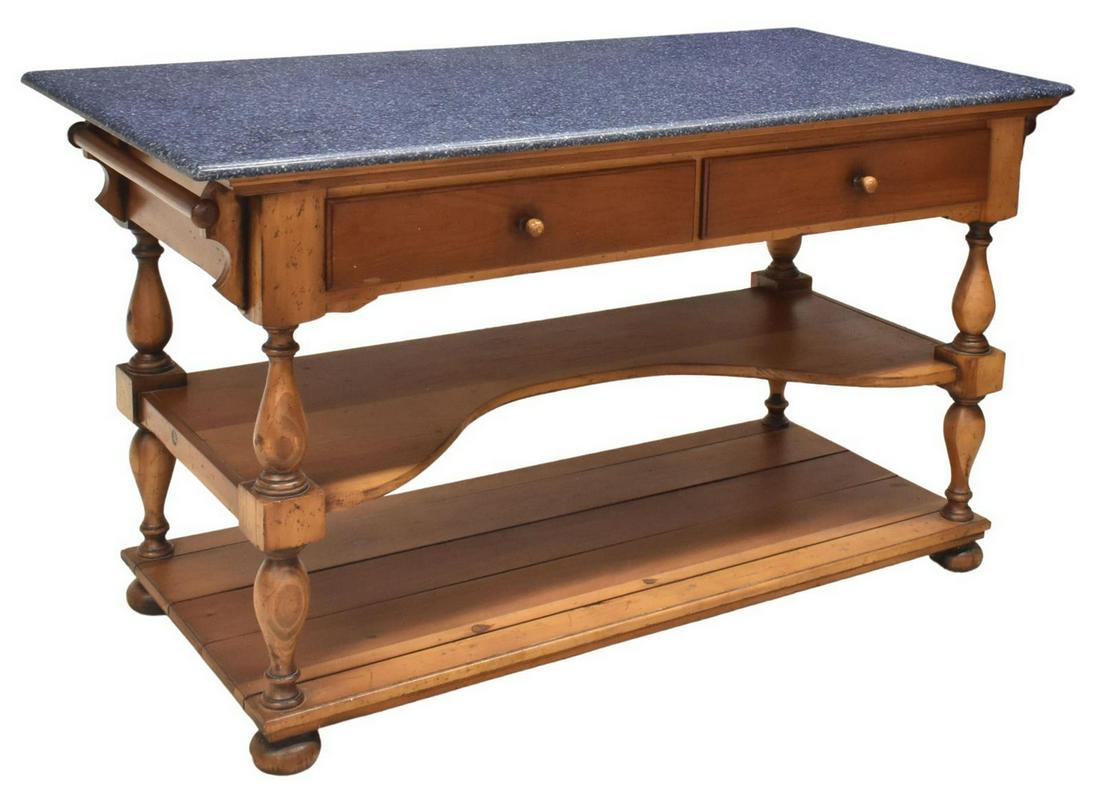 FRENCH STYLE STONE-TOP FRUITWOOD KITCHEN ISLAND: French style fruitwood kitchen island, late 20th c., stone top over two drawers, sides with towel bars, two tiers open shelves, turned supports, on bun feet, approx 36.5"h, 62.5"w, 31.5"d **Provenance