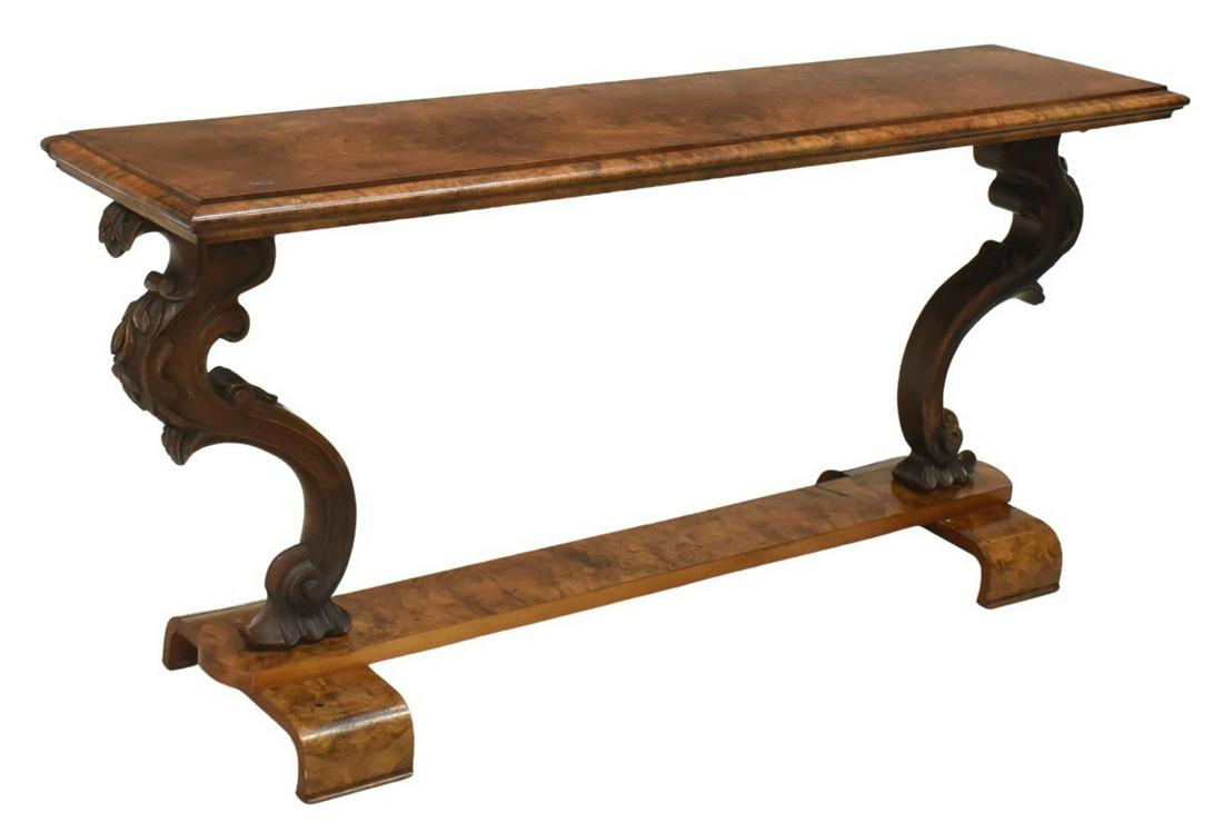 ITALIAN VENETIAN BURLWOOD CONSOLE TABLE: Italian Venetian burlwood console table, late 19th/ early 20th c., having a long rectangular top, over curved supports with carved foliate motifs, stretcher-joined base, rising on curved feet, restora