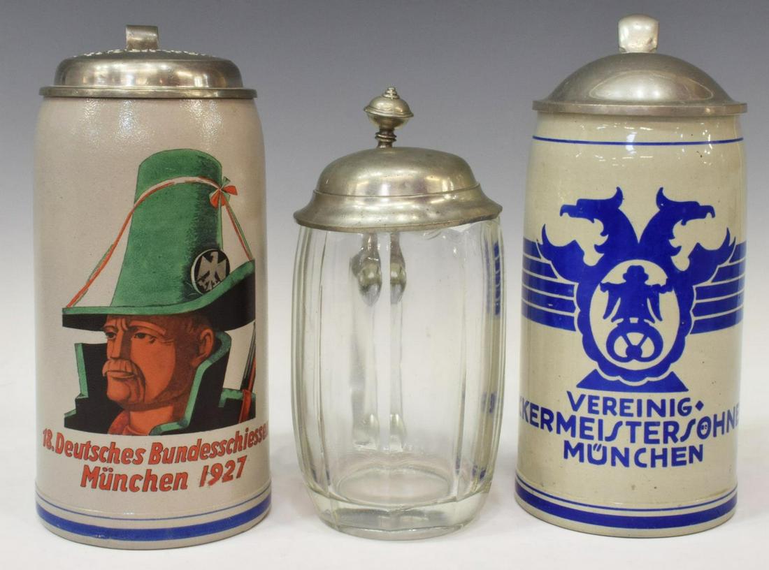 (3) GERMAN BEER STEINS, ONE 1927, ONE DOUBLE EAGLE: (lot of 3) Beer steins, including: (1) German Federal Shooting, July 10, 1927, Munich, gray finish with green hatted figure, scrolled thumblift, pewter lid with date, 8.5"h; (1) gray finish, blue doub
