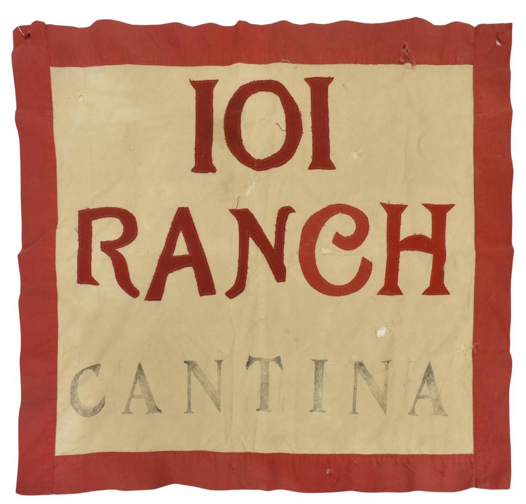 101 RANCH CANTINA BOOTH BANNER: 101 Ranch Cantina banner, the first in red lettering, "Cantina" stenciled in black, authenticity unknown, holes, approx 25"h, 27"w, 0.25lbs **Note: The 101 Ranch, located near Ponca, Oklahoma, began t
