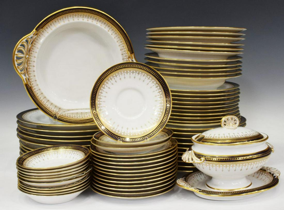 (69) COPELAND SPODE GILT & COBALT DINNER SERVICE: (lot of 69) English Copeland Spode bone china service, early 20th c., all marked underfoot as pattern R2995, having parcel gilt and cobalt blue border of diamonds and festoons, including: (11) dinner 