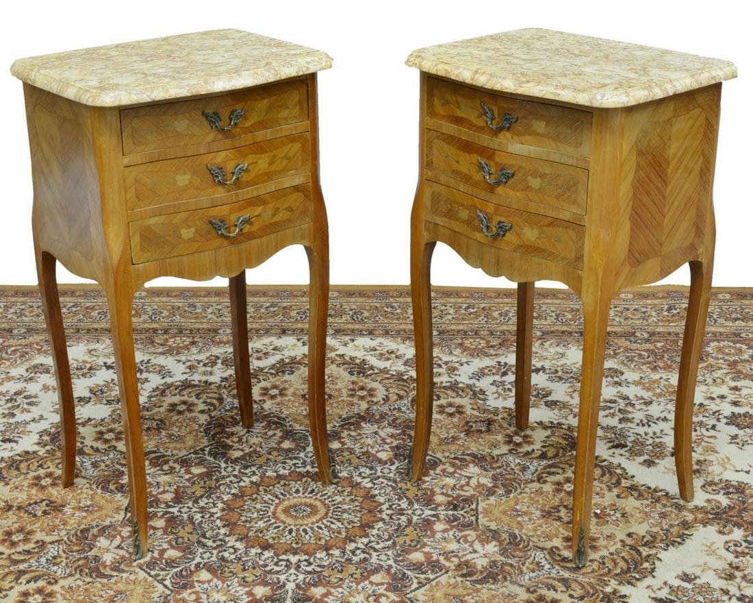 (2) FRENCH LOUIS XV STYLE MARBLE-TOP NIGHTSTANDS: (lot of 2) French Louis XV style marble-top nightstands, 20th c., case in matched mahogany veneers, three drawers accented with floral marquetry, rising on French bracket feet, approx 29.25"h, 16.5"w,