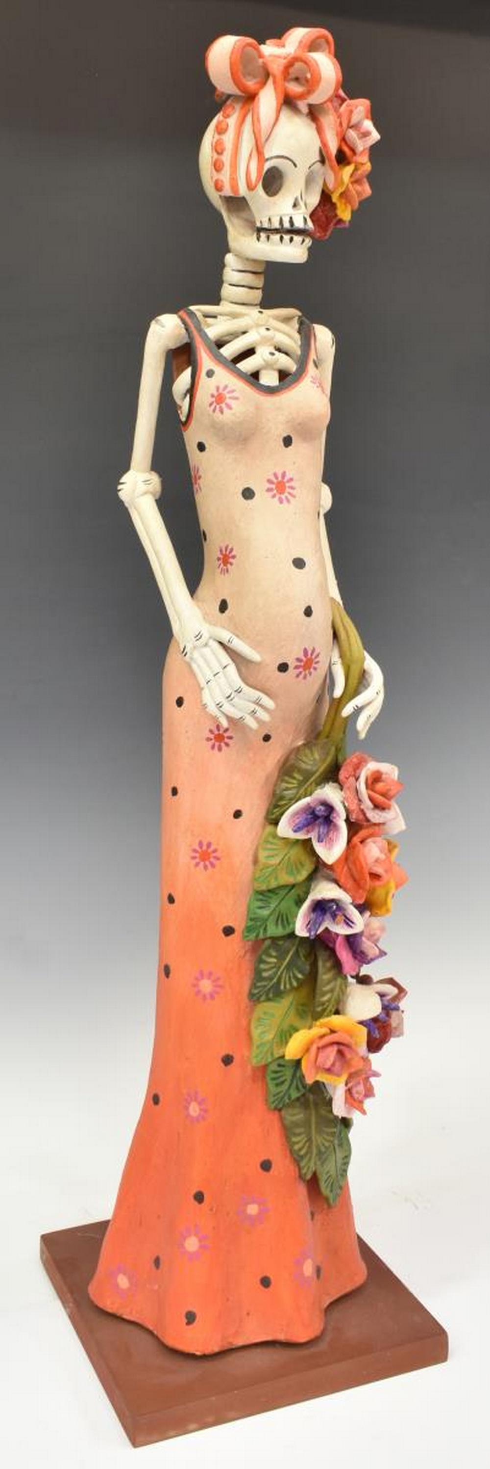 LA CANDELARIA JUAN TORRES DAY OF THE DEAD SKELETON: Folk art Day of the Dead pottery calaca figure, La Candelaria, workshop of Juan Torres Calderon (Mexican, b.1942), Capula, Michoacan, Mexico, 20th c., rising on square base, approx 31"h, 8"w, 11lbs St