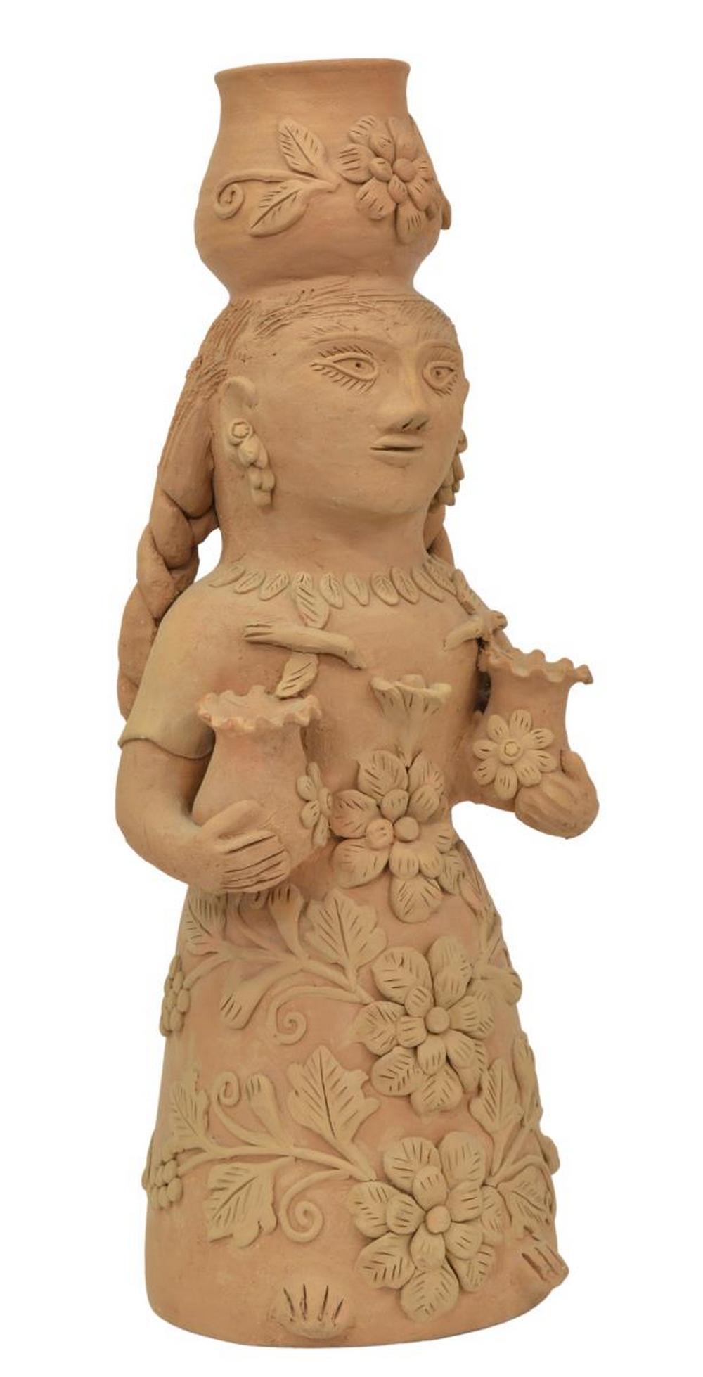 TEODORA BLANCO OAXACA MEXICO POTTERY FIGURE: Folk art earthenware figural vessel, signed T.B. (Teodora Blanco Nunez, Santa Maria Atzompa, Oaxaca, Mexico, 1928-1980), dated 1973, unglazed, her skirt decorated with flowers and grapevines, approx 1