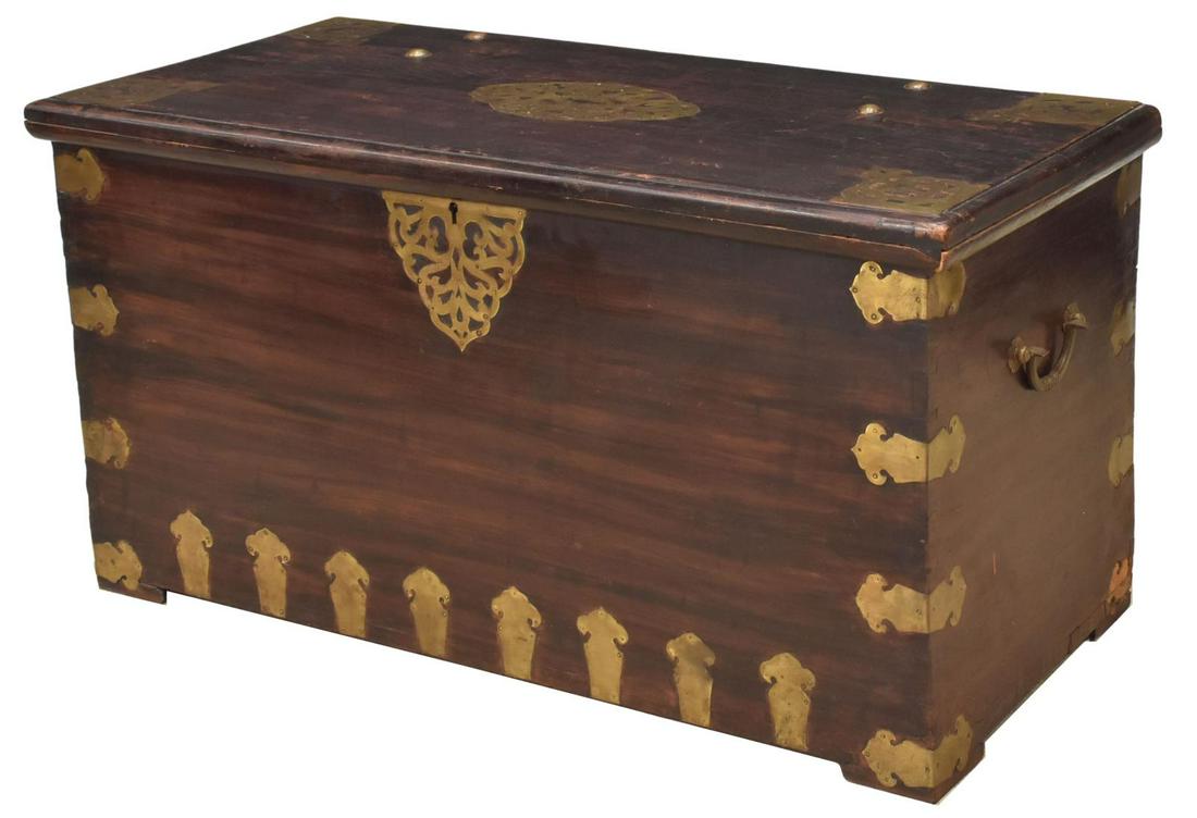 LARGE BRITISH COLONIAL BRASS-BOUND STORAGE TRUNK: British Colonial rosewood storage chest, 20th c., rectangular case with brass hinges, scrolling brass inlay and central cartouche, opening to interior storage, with side till, dual brass handles, appr