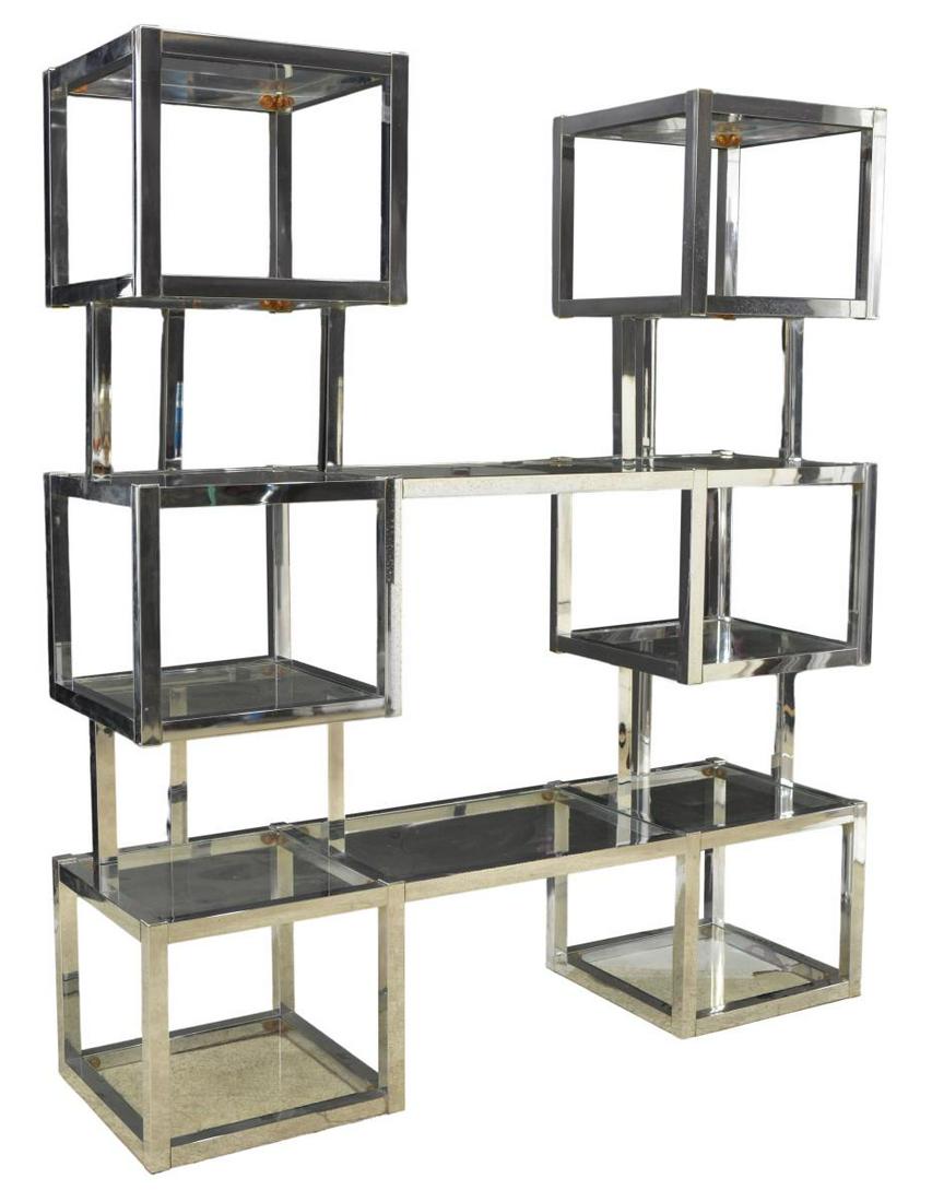 LARGE MODERN CUBIST DESIGN CHROME DISPLAY SHELVES: Large mid-century modern glass and chrome modular shelving unit/ bookcase, in the manner of Milo Baughman (American, 1923-2003), c.1970s-1980s, geometric chromed frame of cubist design, housing colorl