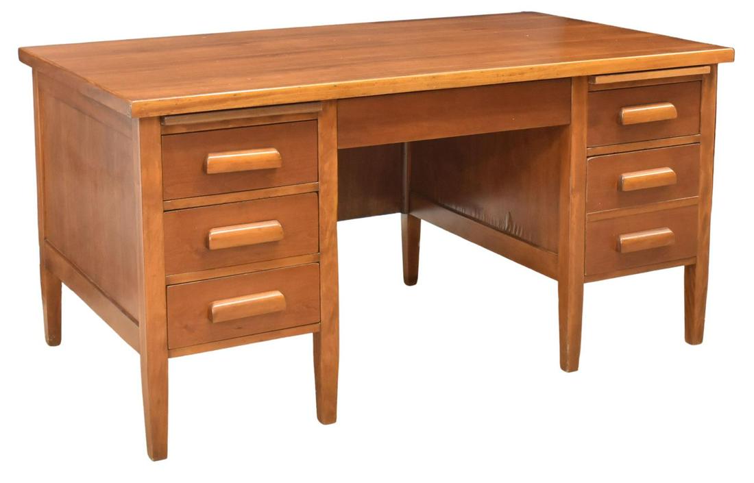 AMERICAN B.F. HUNTLEY FURNITURE WRITING DESK: American writing desk, B.F. Huntley Furniture Company, mid 20th c., large rectangular top, center drawer over kneehole, flanked by three drawers on left side, two drawers on right with faux drawer fro