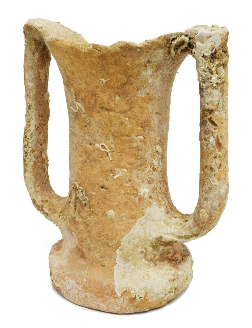 SHIPWRECK DOUBLE-HANDLED AMPHORA: Shipwreck amphora, having a flared rim, with double handles, open bottom, approx 12"h, 9.25"diam, 7.5lbs Start Price: $100.00