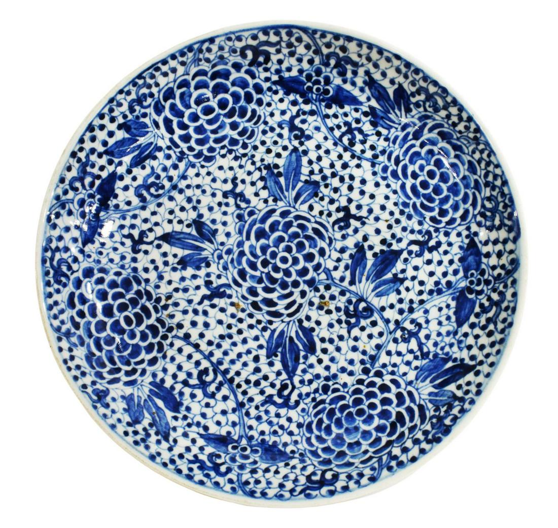 CHINESE BLUE & WHITE PORCELAIN PEONY CHARGER: Chinese porcelain charger, in the Kangxi style, blue underglaze with flowering peony stems, approx 14.25"diam, 3lbs **Provenance: From the estate of Ali A. Abssi (1934-2020) and Florence Hall Abssi (1