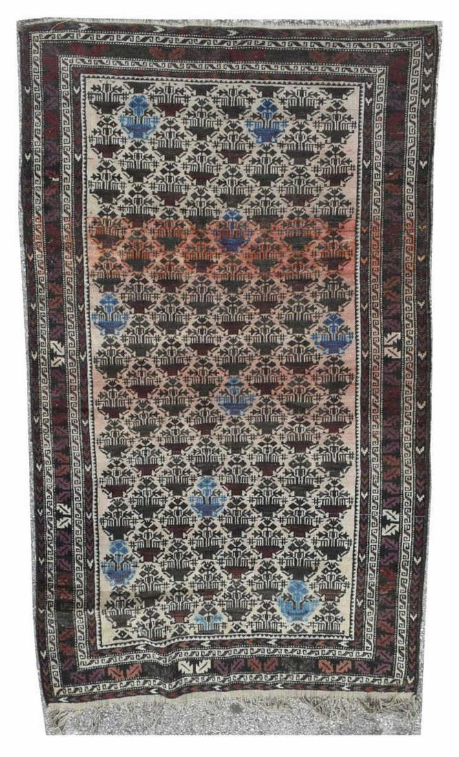 HAND-TIED OVERSIZE BALUCHI RUG, 6'5.5" x 3'8.5": Hand-tied oversized Baluchi rug, approx 6'5.5"l, 3'8.5"w **Provenance: From the estate of Ali A. Abssi (1934-2020) and Florence Hall Abssi (1919-2014), founders of the Ishtar Gate Gallery in the prest