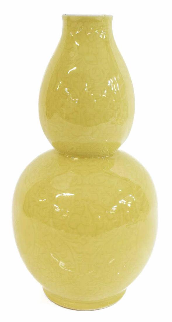 CHINESE YELLOW PORCELAIN DOUBLE GOURD VASE: Chinese porcelain Huluping double gourd vase, pale yellow glaze, incised floral motifs, honorific blue six character base mark, approx 12"h, 6.25"diam, 3.5lbs **Provenance: From the estate of Ali A. A