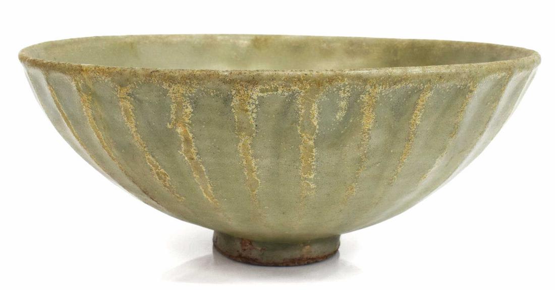 SAWANKHALOK CELADON GLAZED LOTUS BOWL: Celadon glazed lotus bowl, possibly Sawankhalok, Thailand, fluted exterior, on a narrow raised foot, restored transverse crack, approx 3.25"h, 8 1/8"diam, 1.5lbs **Provenance: From the estate of Ali A