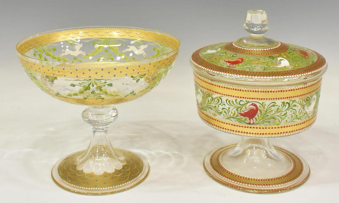 (2) PARCEL GILT & ENAMELED GLASS COMPOTE & DISH: (lot of 2) Parcel gilt and enameled glass tableware, including: (1) footed compote, with leaping deer, knopped stem, on a circular foot, approx 7 1/8"h, 8 7/8"diam, (1) covered dish, with scarlet and 