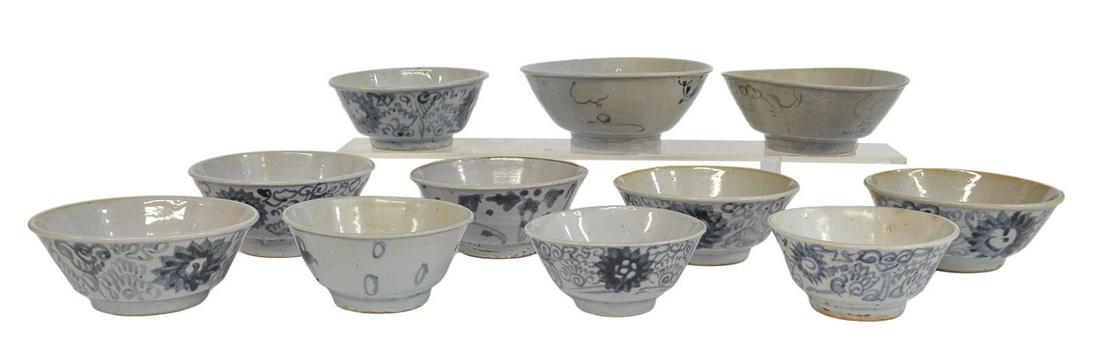 (11) CHINESE MING DYNASTY STYLE PORCELAIN BOWLS: (lot of 11) Chinese Ming Dynasty style porcelain bowls, blue underglaze applied with loose brushstrokes, in scrolling lotus blossom and ling zhi fungus motifs, largest: approx 2.5"h, 6.25"diam; 6lbs t