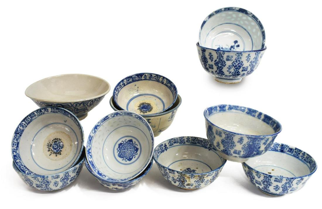 (12) ASIAN BLUE & WHITE PORCELAIN BOWLS: (lot of 12) Asian blue and white porcelain bowls, (eight) with stenciled blue underglaze decoration, largest: approx 2.5"h, 6"diam; 6lbs total **Provenance: From the estate of Ali A. Abssi (1934-2020)