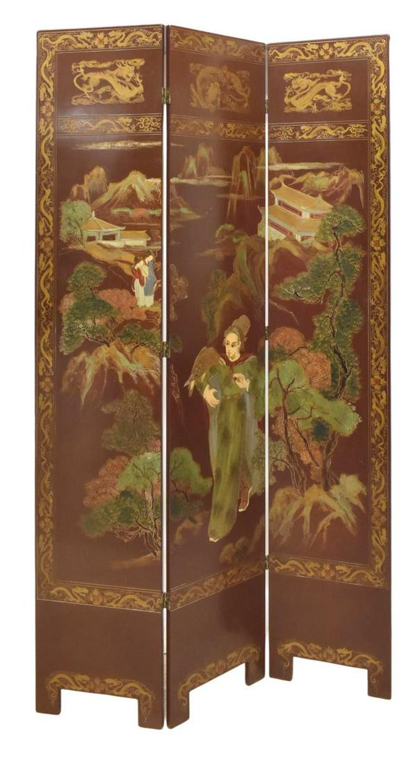 CHINESE RED LACQUER THREE-PANEL FOLDING SCREEN: Chinese three-panel folding screen, late 20th c., red lacquered finish, one side with gilt painted bamboo and foliate motifs with birds, reverse depicting figural landscape scene with dragon border, a