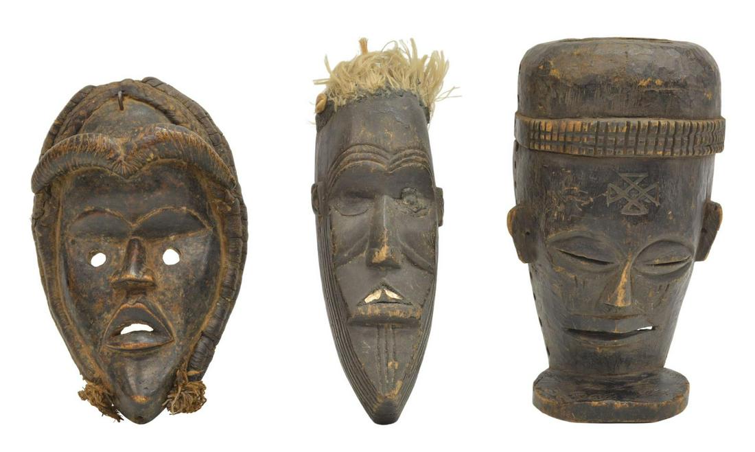 (3) AFRICAN TRIBAL CARVED WOOD MASKS: (lot of 3) African carved wood masks, of varied size and design, largest: approx 9.5"l, 5.25"w; 2lbs total **Provenance: From the estate of Ali A. Abssi (1934-2020) and Florence Hall Abssi (1919-2014)