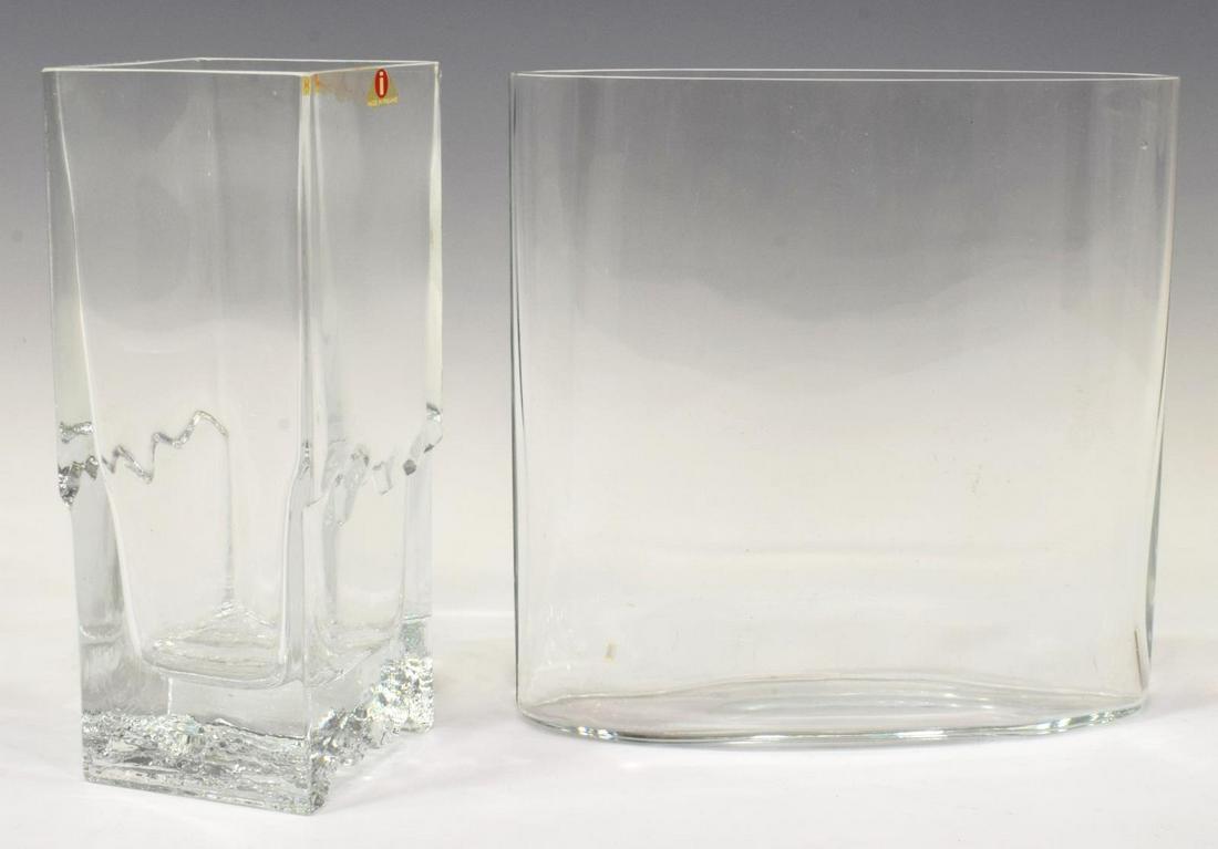 (2) MODERN IITTALA 'OVALIS' & 'RAITO' GLASS VASES: (lot of 2) Finnish modernist glass vases, designed by Tapio Wirkkala (Finnish, 1915-1985) for Iittala, including: (1) "Ovalis" vase, approx 6.5"h, 6.5"w, 2.25"d, (1) "Raito" vase, approx 6.5"h, 2 5/8"