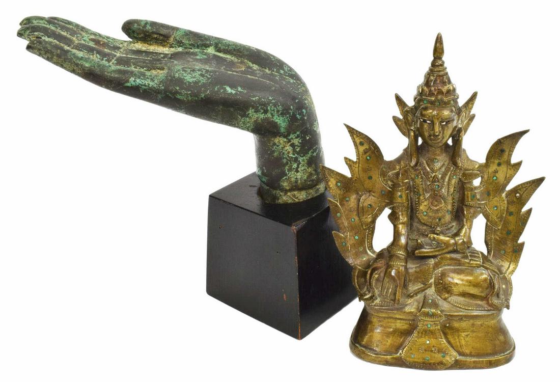 (2) BRONZE HAND OF BUDDHA & THAI SEATED BUDDHA: (lot of 2) Bronze Buddhist statues, including: (1) hand of Buddha, in Abhaya Mudra, seated in wood plinth stand, approx 10.75"h, 4"w, 3.75"d, (1) Thai Buddha, seated in Bhumisparsha (earth-touching) M