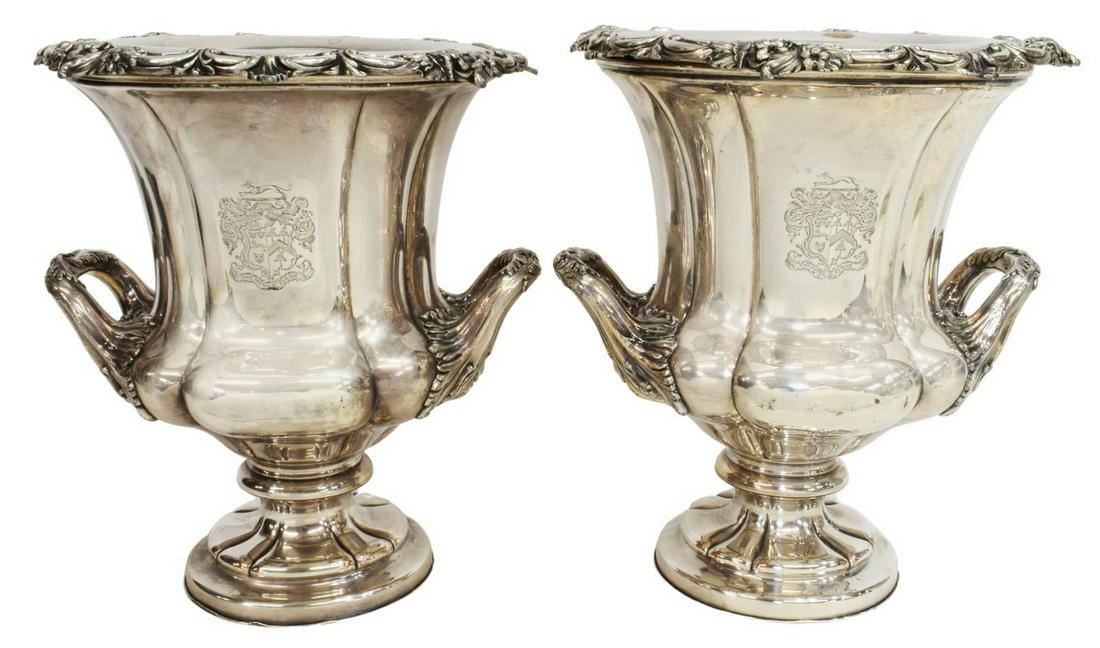 (2) ENGLISH HENEAGE SILVER PLATE WINE COOLERS: (pair) Large English silver plate wine coolers, both bearing the Heneage Coat of Arms, with motto Toujours Firme (Always Firm) in a banner below, campana form with removable insert, floral accented ri