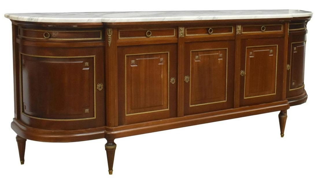 LOUIS XVI STYLE MARBLE-TOP MAHOGANY SIDEBOARD: French Louis XVI style marble-top mahogany sideboard, mid to late 20th c., having a long shaped marble top, over three center drawers and cabinet doors, flanked by curved side drawer above cabinet doo