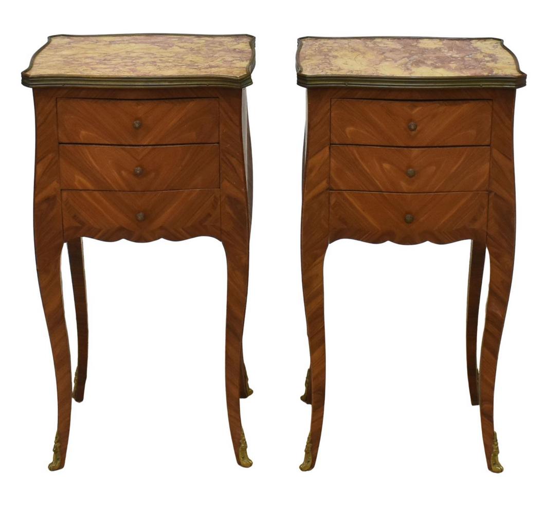 (2) FRENCH LOUIS XV STYLE MARBLE-TOP NIGHTSTANDS: (pair) French Louis XV style marble-top mahogany nightstands, early 20th c., shaped marble top, over case in matched veneers, fitted with three drawers, rising on cabriole legs, ending in sabots, appr