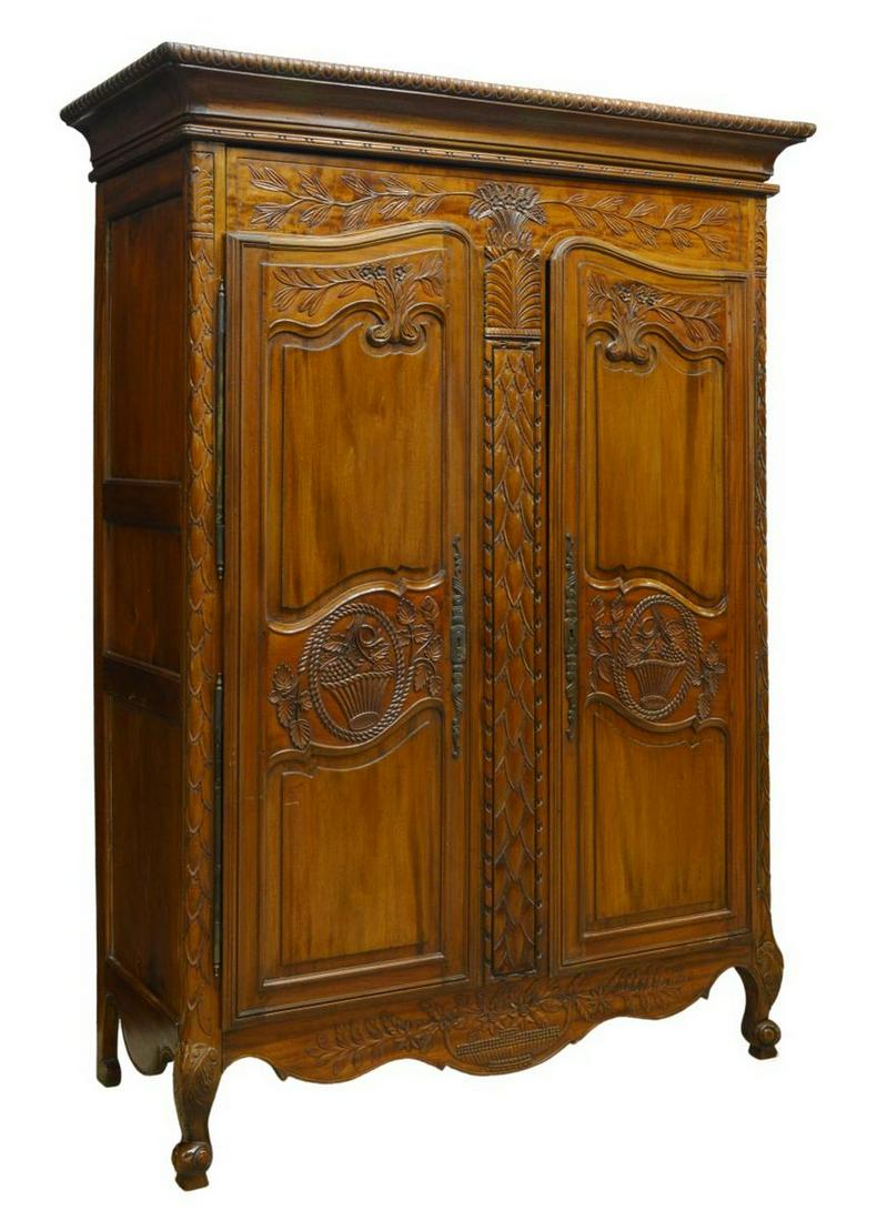 LOUIS XV STYLE CARVED MAHOGANY ARMOIRE: Louis XV style mahogany armoire, 20th c., molded cornice, over floral-carved frieze, paneled double doors on exterior hinges, rising on short cabriole legs, ending in whorl feet, approx 88.5"h, 63"w, 
