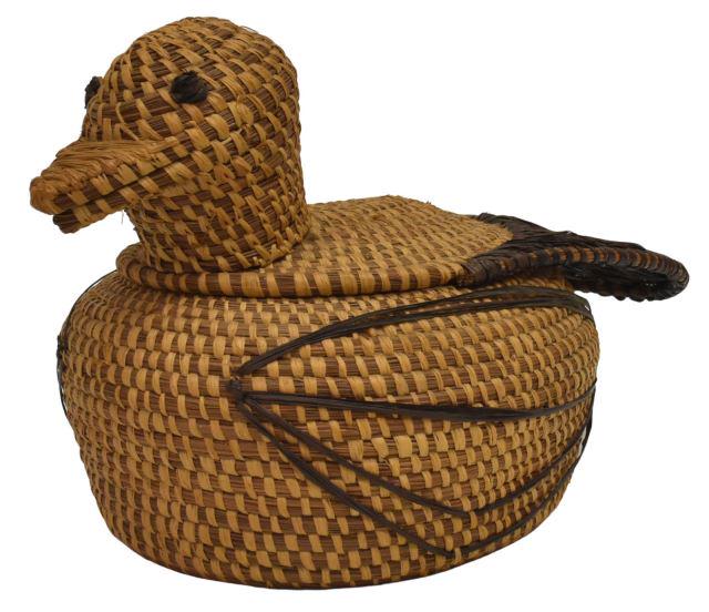 COUSHATTA BIRD-FORM WOVEN PINE-NEEDLE BASKET: Native American woven lidded pine-needle basket, Coushatta, c.1940-1970, formed as a bird on nest, approx 7.25"h, 12.25"w, 7"d, 0.75lbs Start Price: $50.00