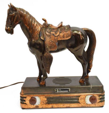 ABBOTWARES STANDING HORSE RADIO, MODEL Z477,1940s: Abbotwares tube radio, Standing Horse, Model #Z477, c.1940s, in a worn copper finish, with two dials, approx 14"h, 11.75"l, 4.25"w, 14.5lbs **Provenance: from a San Antonio, Texas collection** Start P