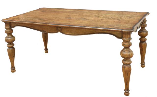 PORTICO OLD WORLD RUSTIC PECAN DINING TABLE: Portico Old World Rustic pecan dining table, late 20th c., distressed wood, having rounded corners, over scalloped apron, rising on turned tapered legs, approx 31"h, 72"w, 38.5"d Start Price: $400.00