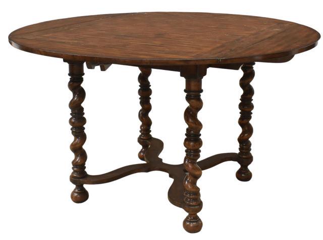 RUSTIC DROP-LEAF 54" ROUND DINING TABLE: Rustic drop-leaf table, late 20th c., square tabletop, demilune drop leaves opening to a circular tabletop, barley twist supports joined by cross stretcher, on bun feet, approx 30.5"h, 38"w, 38"d, lea