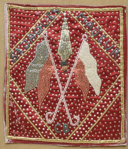 CLOTAIRE BAZILE HAITIAN BEADED VOODOO DRAPEAU FLAG: Haitian beaded and sequined Voodoo ceremonial drapeau flag or banner, St. Jaques [Jacques] Majeur, signed in beading C.B. (Clotaire Bazile, Haitian, 1946-2012), with crossed flags, mounted to stretche