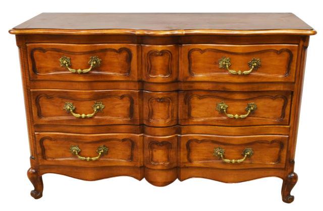 FRENCH LOUIS XV STYLE FRUITWOOD COMMODE: French Louis XV style fruitwood commode, 20th c., shaped top, over case fitted with three serpentine drawers, foliate gilt metal drawer pulls, on cabriole legs, ending in whorl feet, approx 35"h, 55"w