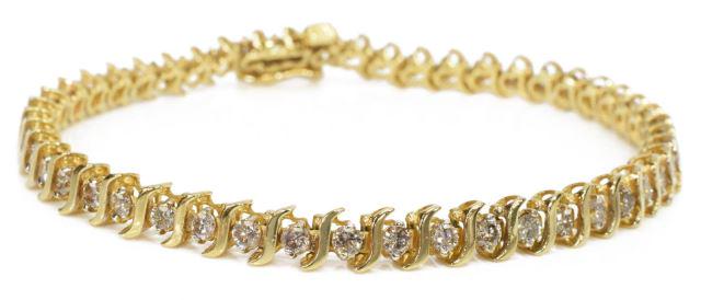 ESTATE 14KT GOLD 1.50CTTW DIAMOND TENNIS BRACELET: Estate 14kt yellow gold tennis bracelet, (forty-nine) diamonds, approx 1.50cttw, average clarity: I1, average color: IJK, box clasp with safety latch, approx 7"l, 9.6 grams (inclusive of all materials