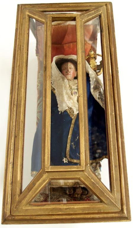 18TH C STATUE, DORMITION OF THE VIRGIN, GUATEMALA: Guatemalan religious figure, "The Dormition of the Virgin", in a giltwood coffin; the polychromed carved wooden figure, c. 1750, with real hair, jewelry, and gilded metal crown, elaborate tunic trimme