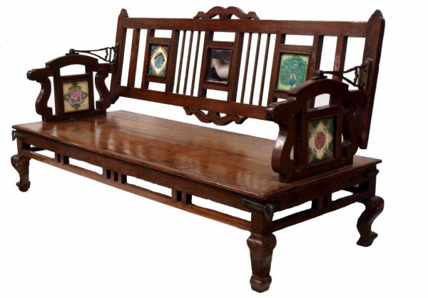 BRITISH COLONIAL REVERSIBLE TEAKWOOD SWING BENCH: British Colonial reversible railroad swing bench of teakwood, 19th c., accented with tiles, mirror and brass fittings, back folds over the wide seat to reverse direction, one tile with damage, restora