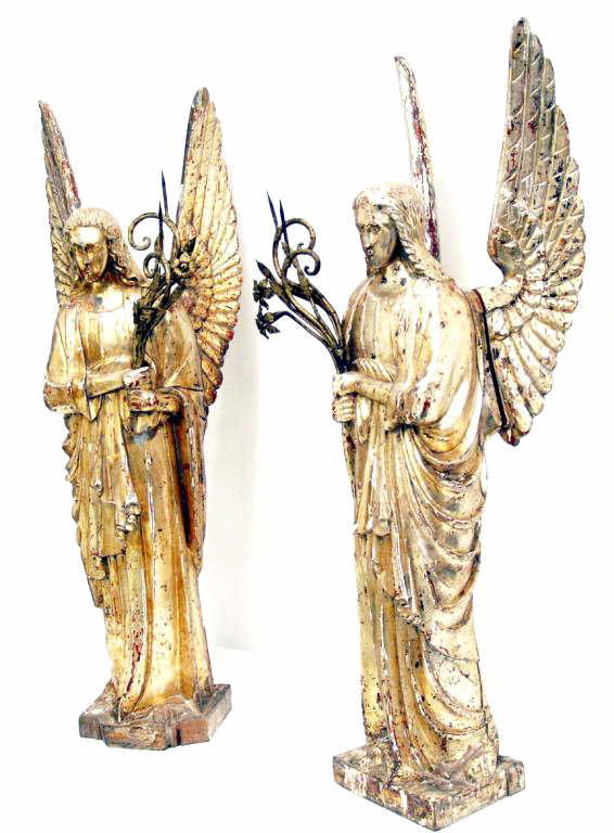 ITALIAN ANTIQUE RELIGOUS CARVED GILTWOOD ANGELS: (pair) Fine Italian carved giltwood angels, mid 19th c., each expressively carved and holding metal flowers, wear to gilding, with detachable wings, assembled: 40"h, 12"w, 13.5"d, 44lbs total