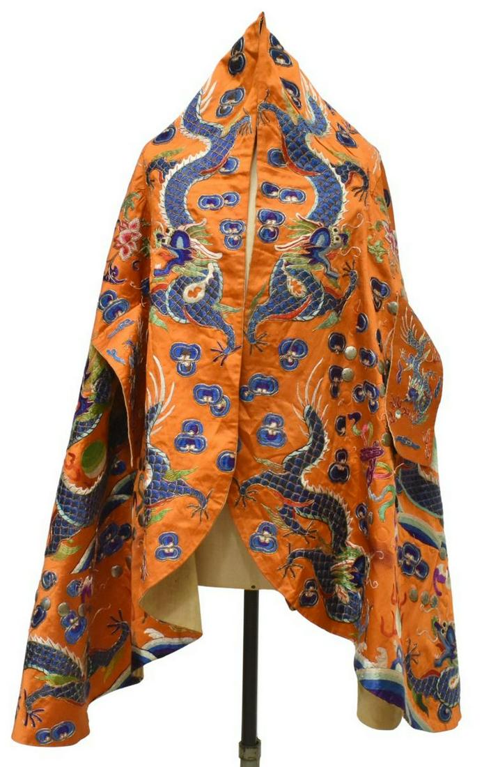 CHINESE DRAGON EMBROIDERED ORANGE SILK GARMENT: Chinese orange silk garment, embroidered with dragons chasing flaming pearl, with couched metallic threads, large metal sequins, woven linen lining Start Price: $80.00