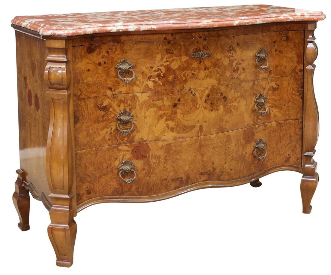 ITALIAN CARONNI MARBLE-TOP MARQUETRY COMMODE: Italian burlwood commode, Caronni Il Mobile Classico, late 20th c., shaped marble top, over case fitted with three drawers, accented with marquetry cornucopia filled with flowers and foliates, canted